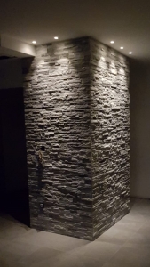 stone wall with dimmed lights