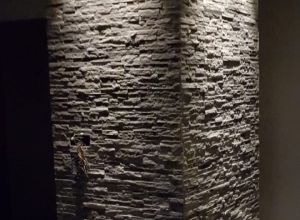 stone wall with dimmed lights